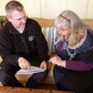 surveyor and customer doing a briefing